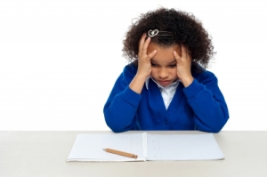 A girl working on a hard problem